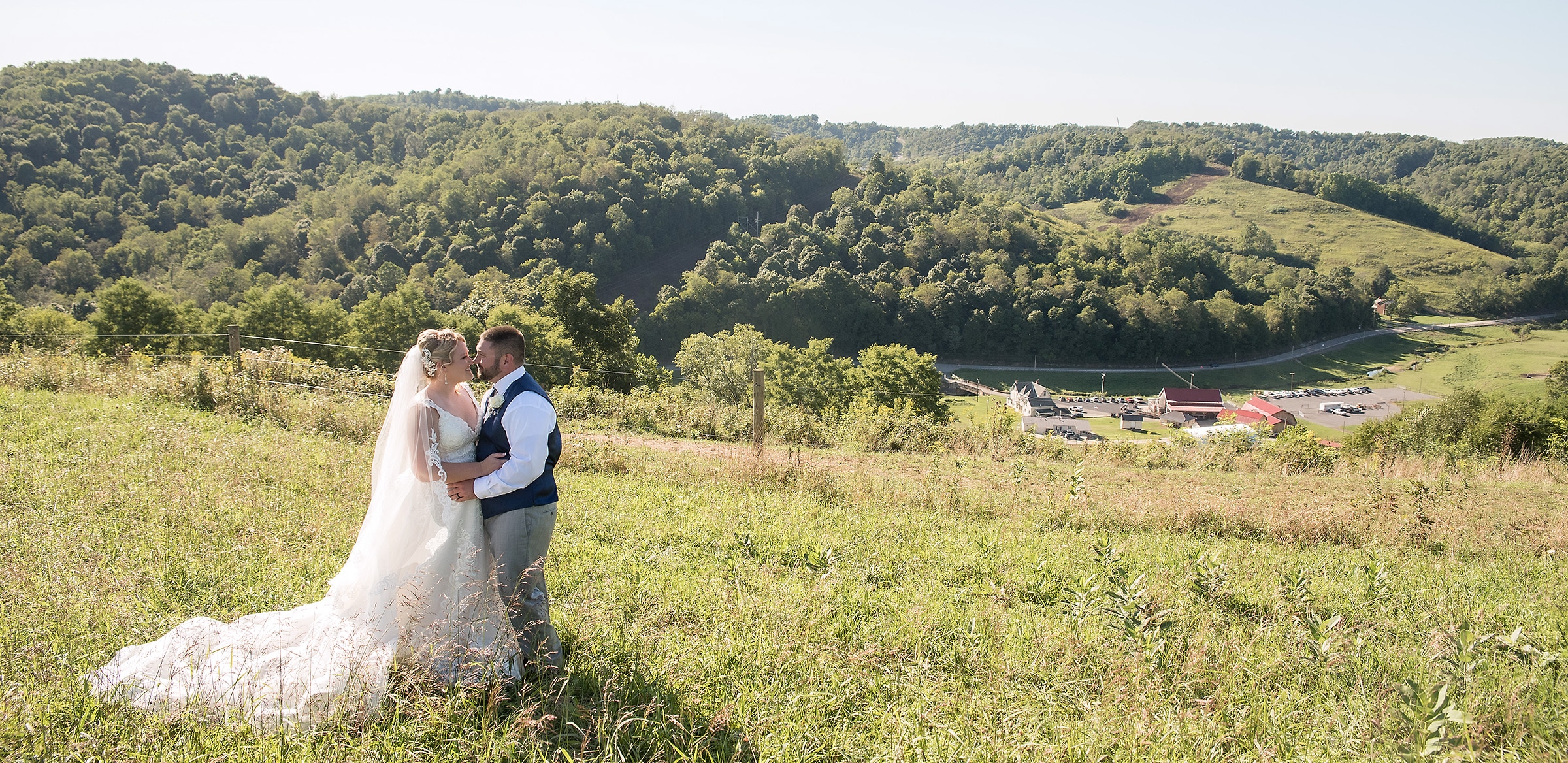 Hilltop Overlook of Bridal Couple at Valley View Farm Venue - photo by McMillen Photography