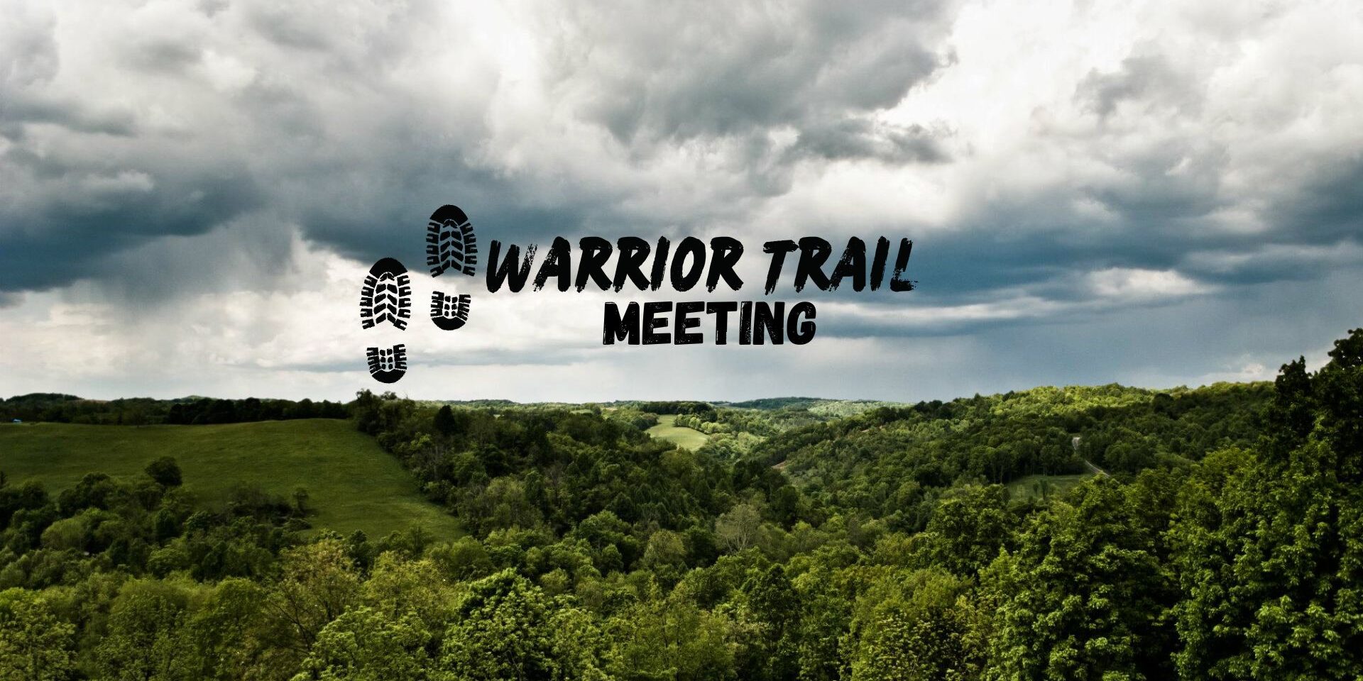 Scenic view of rolling green hills and dense forest under a cloudy sky, with ‘Warrior Trail Meeting’ text and boot print graphics overlaid.