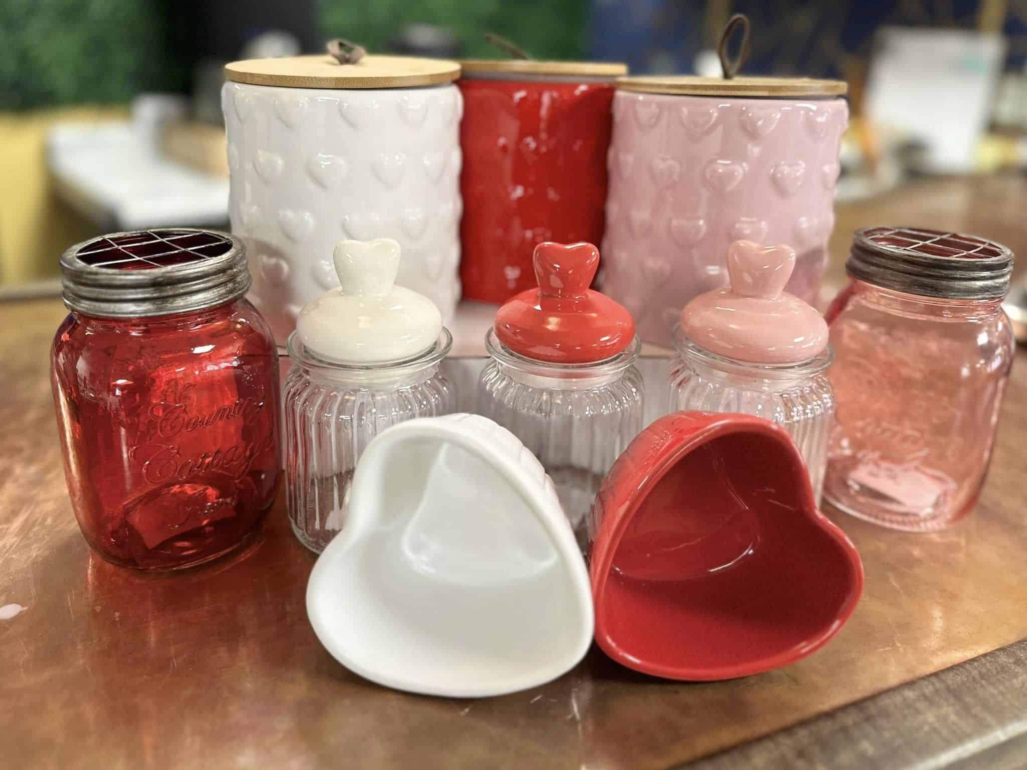 Red, pink, and white Valintine containers.