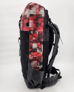 A Hilltop red, black, and white backpack.