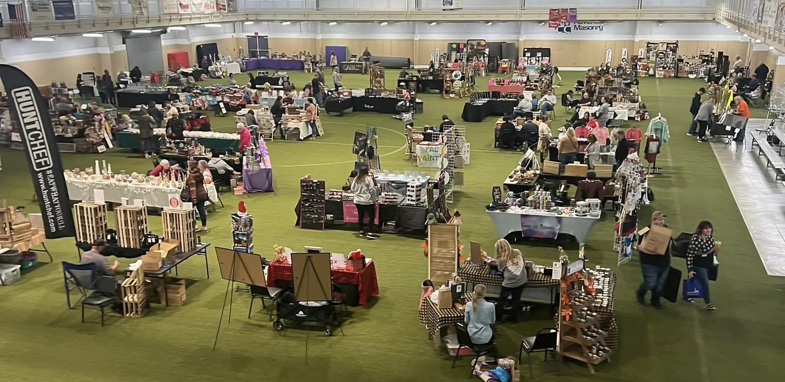 Photograph of Vendor Show at EQT REC Center on their indoor soccer field.