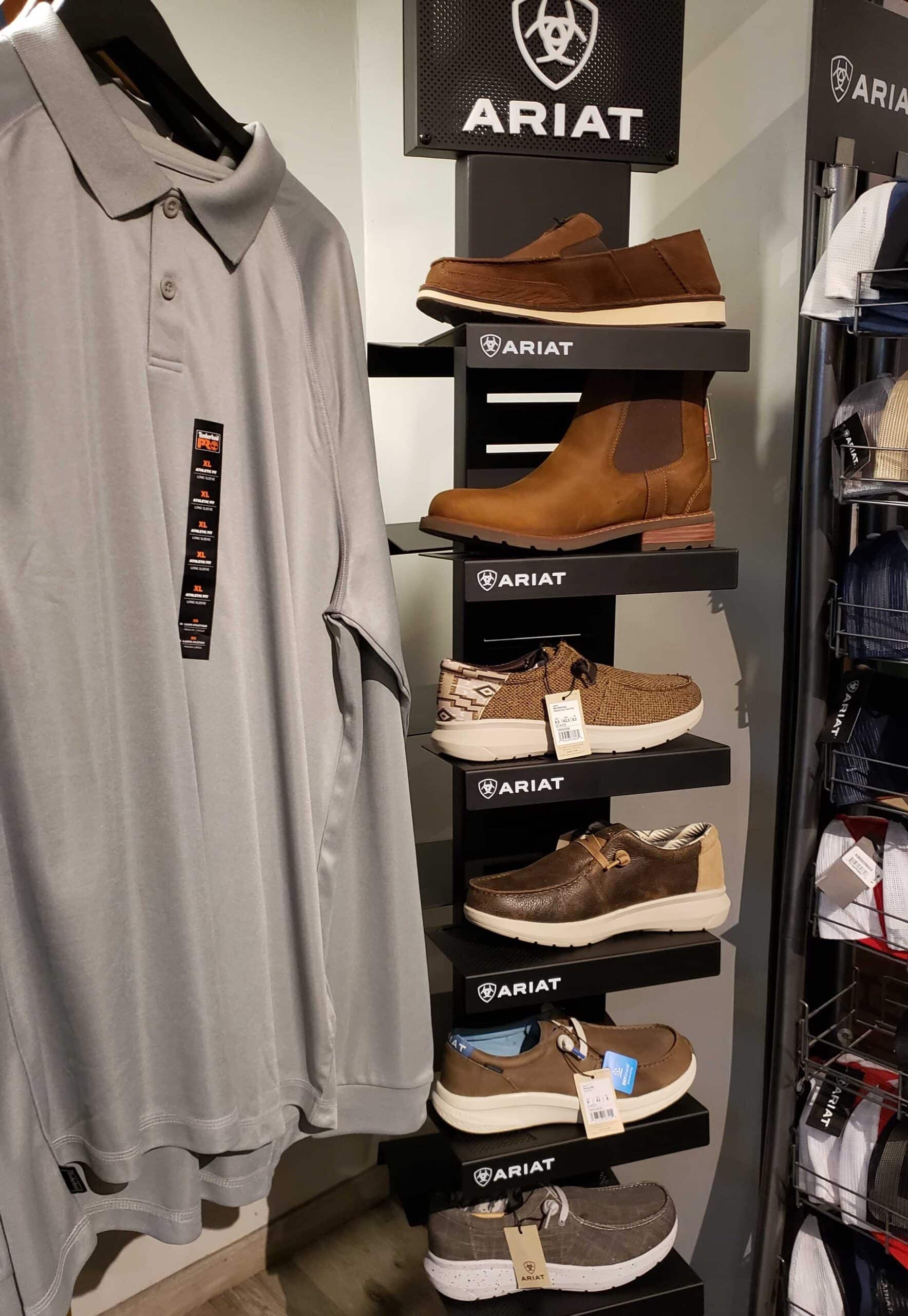 Photograph of Ariat polo and shoes at Mickey's Men's Store.