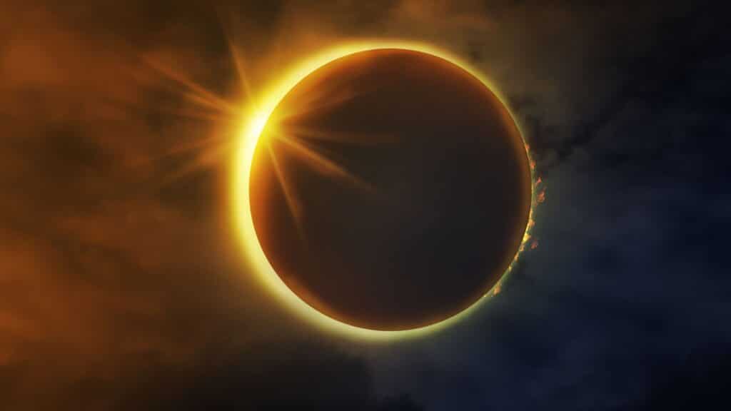 Photograph of a solar eclipse with the sun forming a ring of light around the moon.