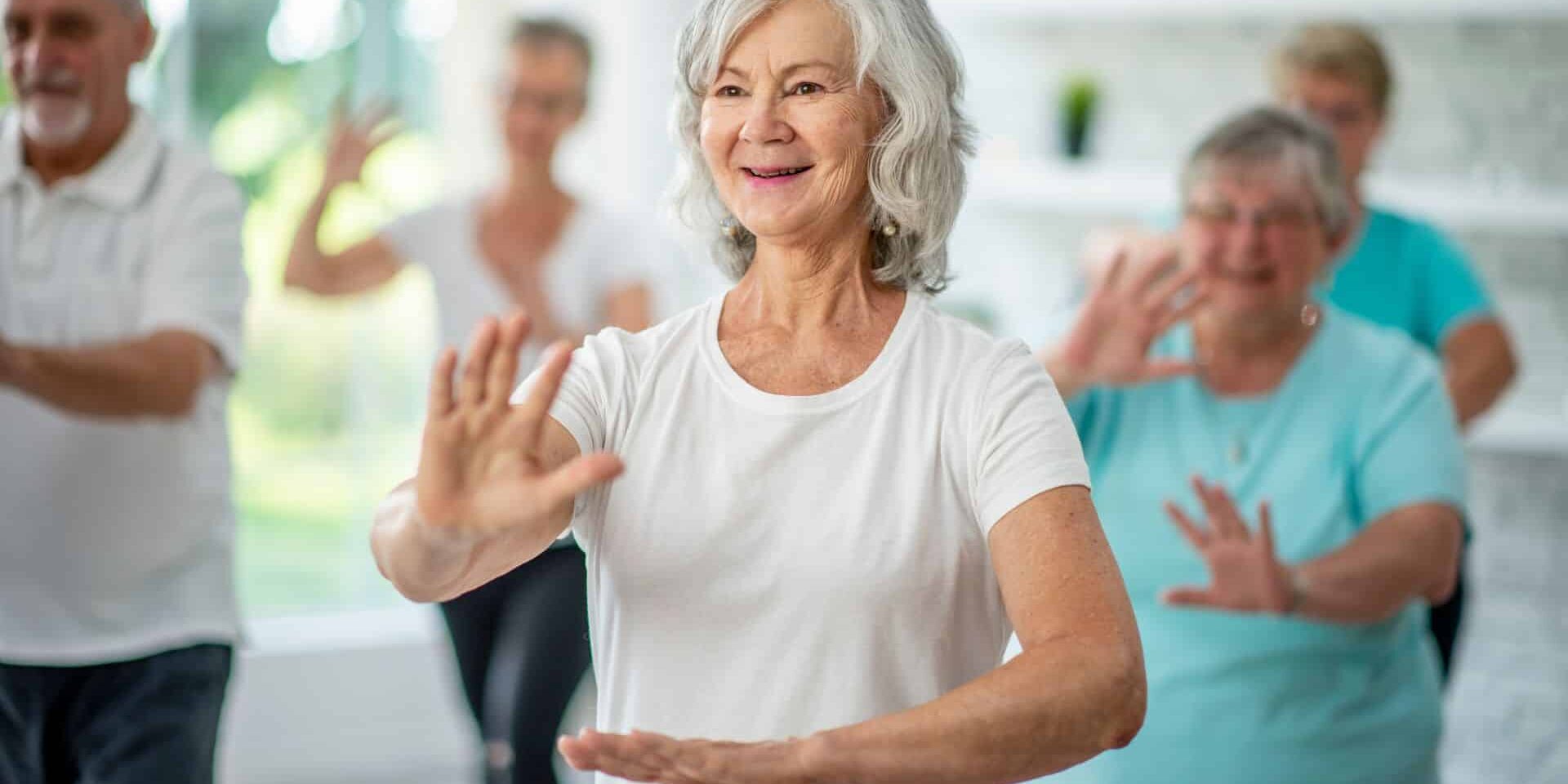 Photograph of a female senior practicing Tai Chi.