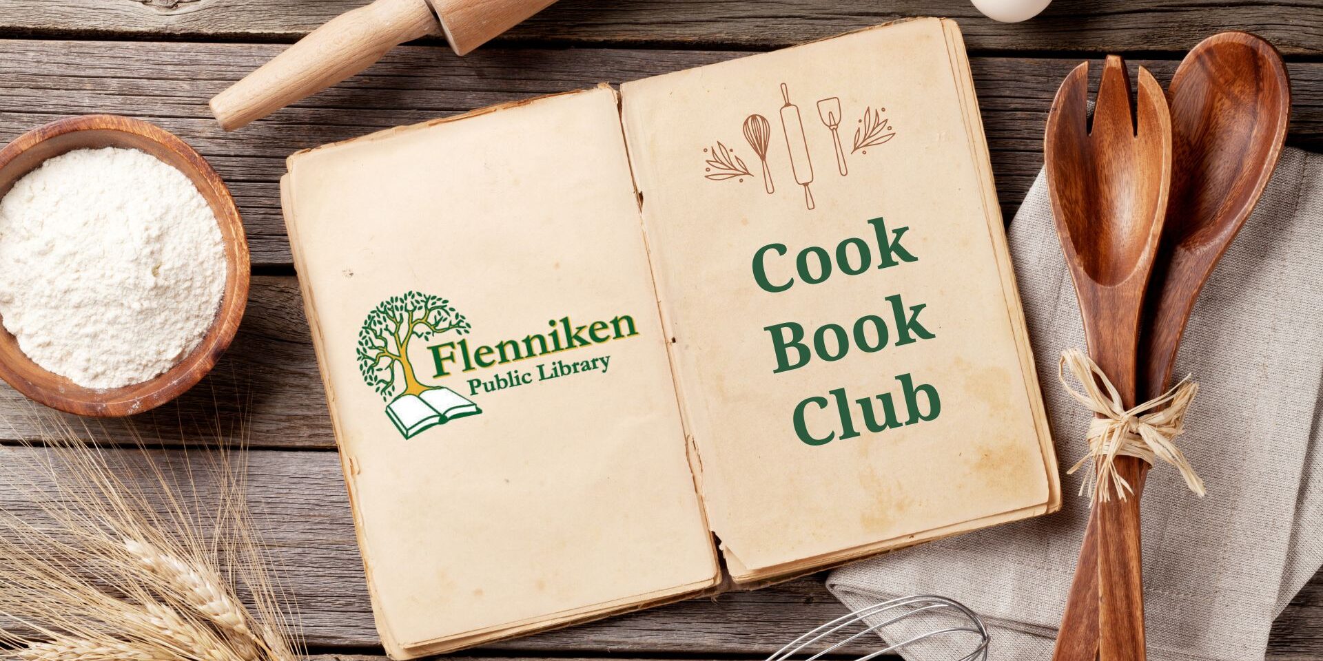Open vintage-style cookbook on a wooden table with baking ingredients and utensils around it. The pages read “Flenniken Public Library” and “Cook Book Club.”
