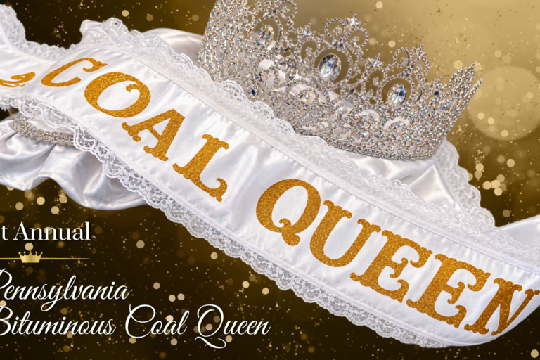 PA Bituminous Coal Queen A silver jeweled crown and white lace-trimmed sash reading “Coal Queen” are displayed against a gold sparkling background, with text identifying the 71st Annual Pennsylvania Bituminous Coal Queen.